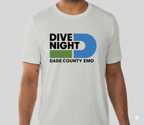 Person wearing a silver t-shirt with 'Dive Night Dade County Emo' design on a light gray background